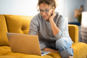 Debt free woman on her laptop